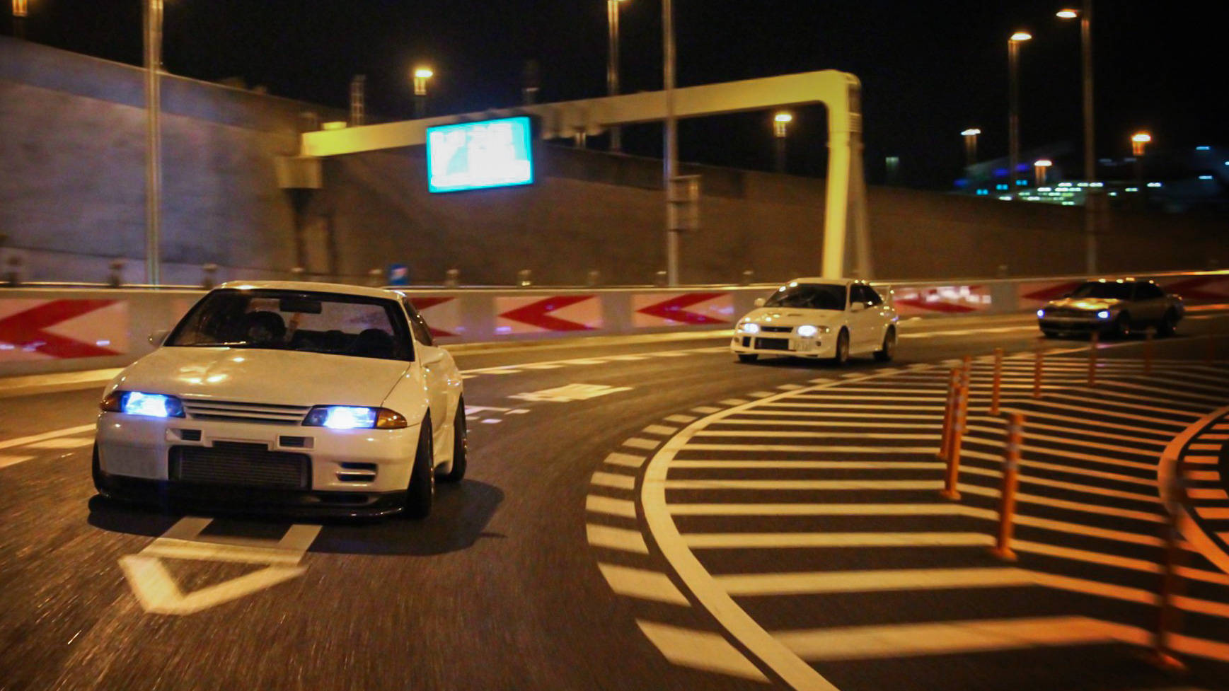سباق سيارات JDM في مدينة الليل خلفية