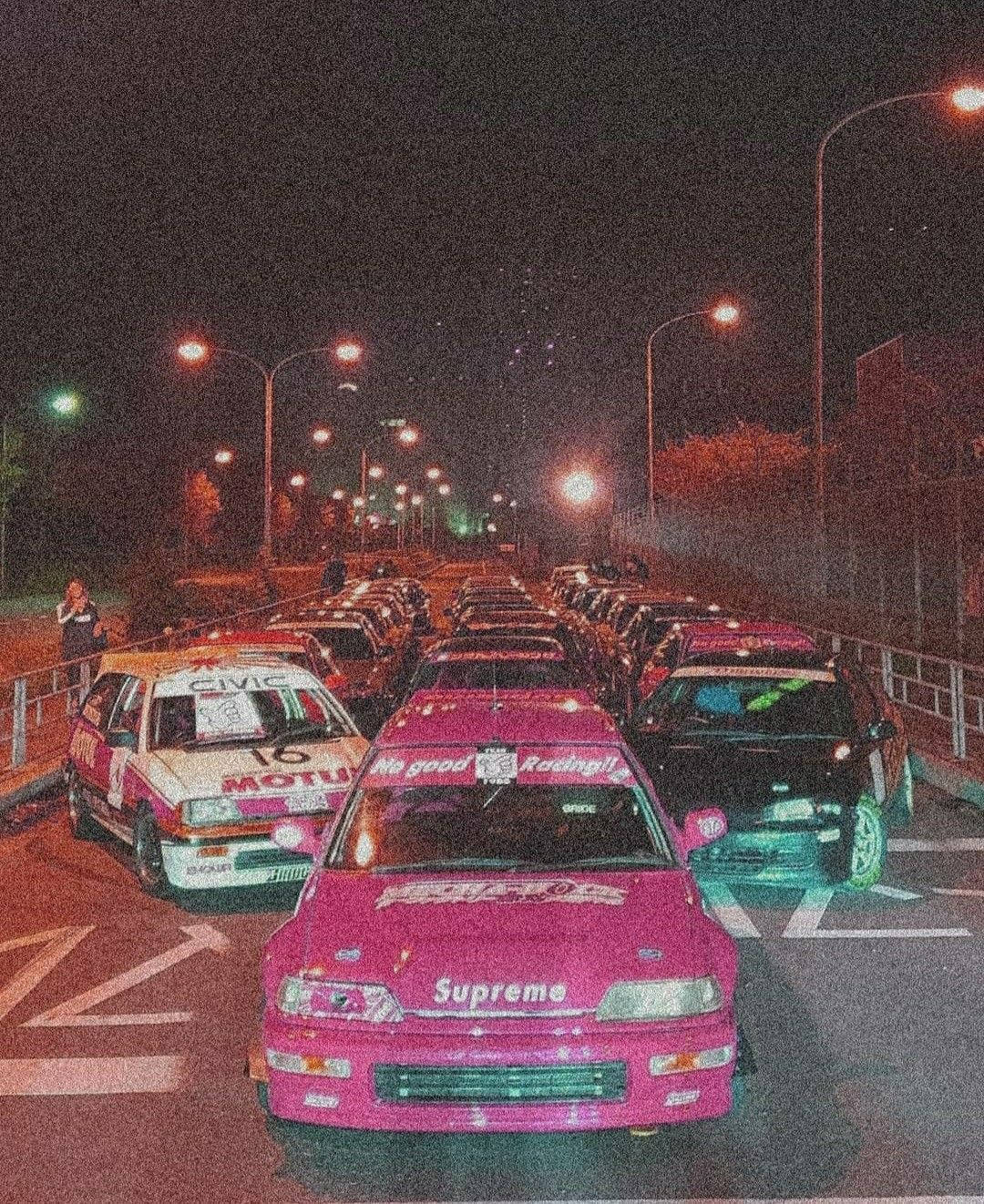 سيارات JDM حبيبية في الليل خلفية