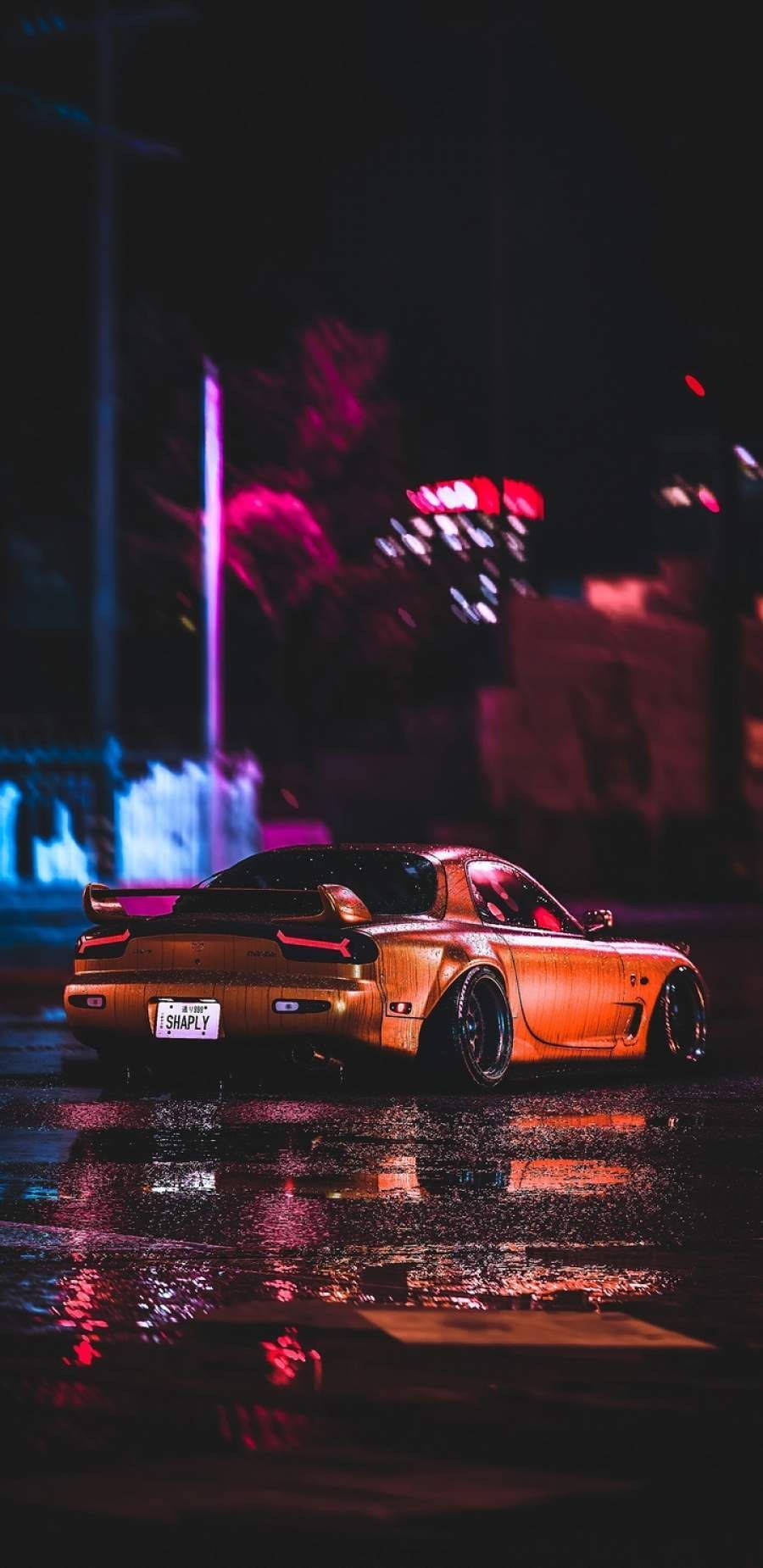 جمالية سيارات JDM البرتقالية ليلاً خلفية