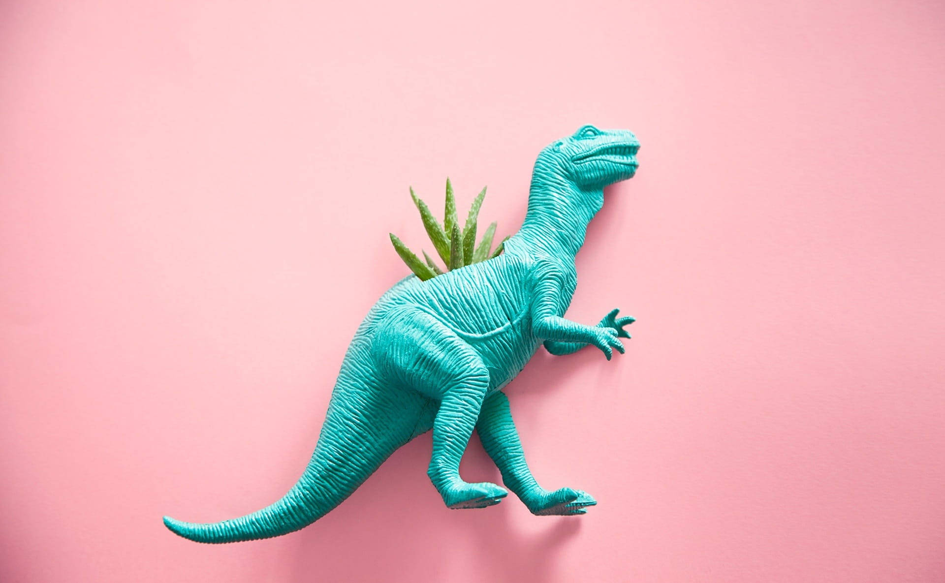 ديناصور T-rex وردي لطيف مع نبات خلفية