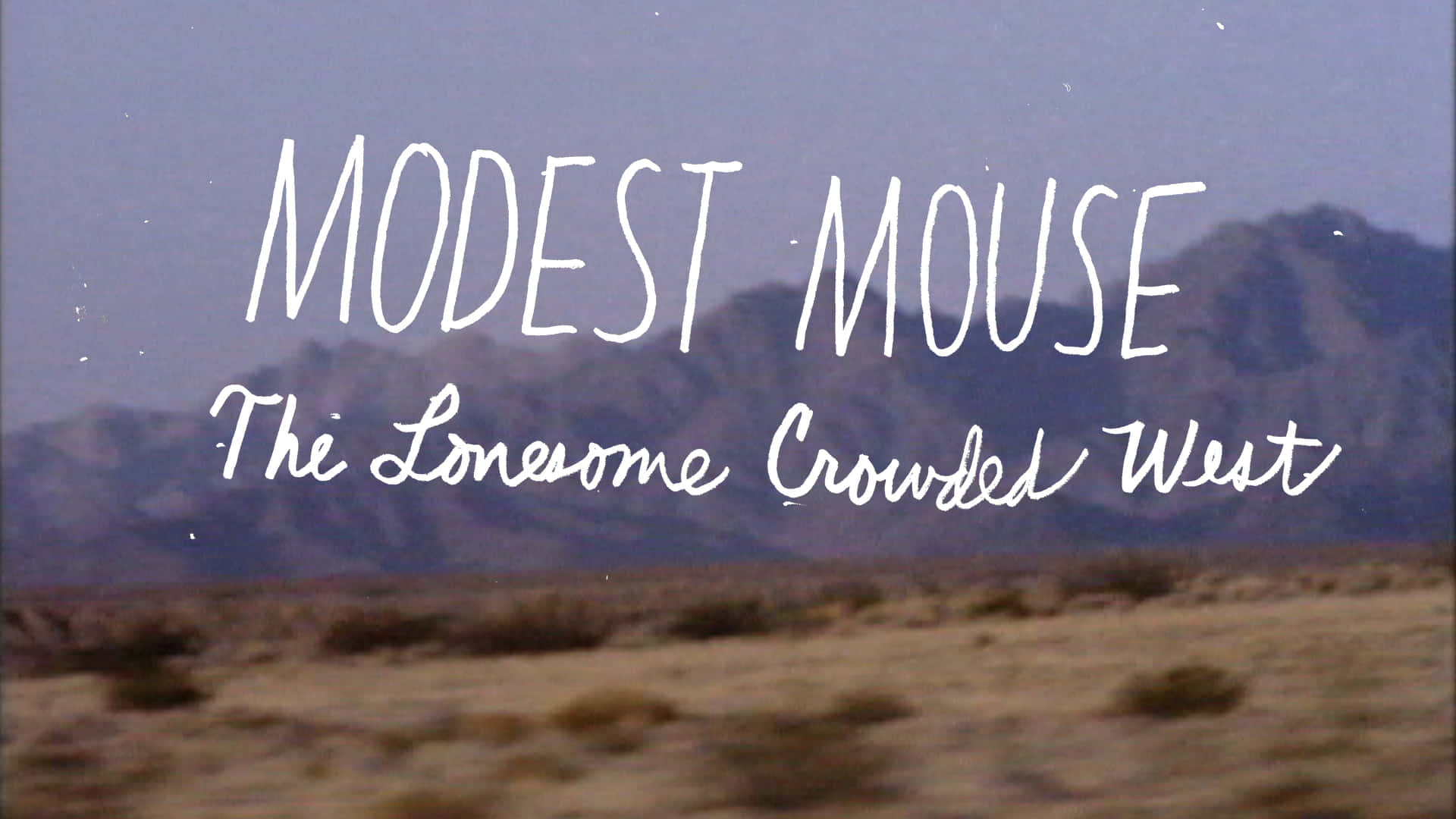 تسليط الضوء على ألبوم موديست ماوس - The Lonesome Crowded West خلفية