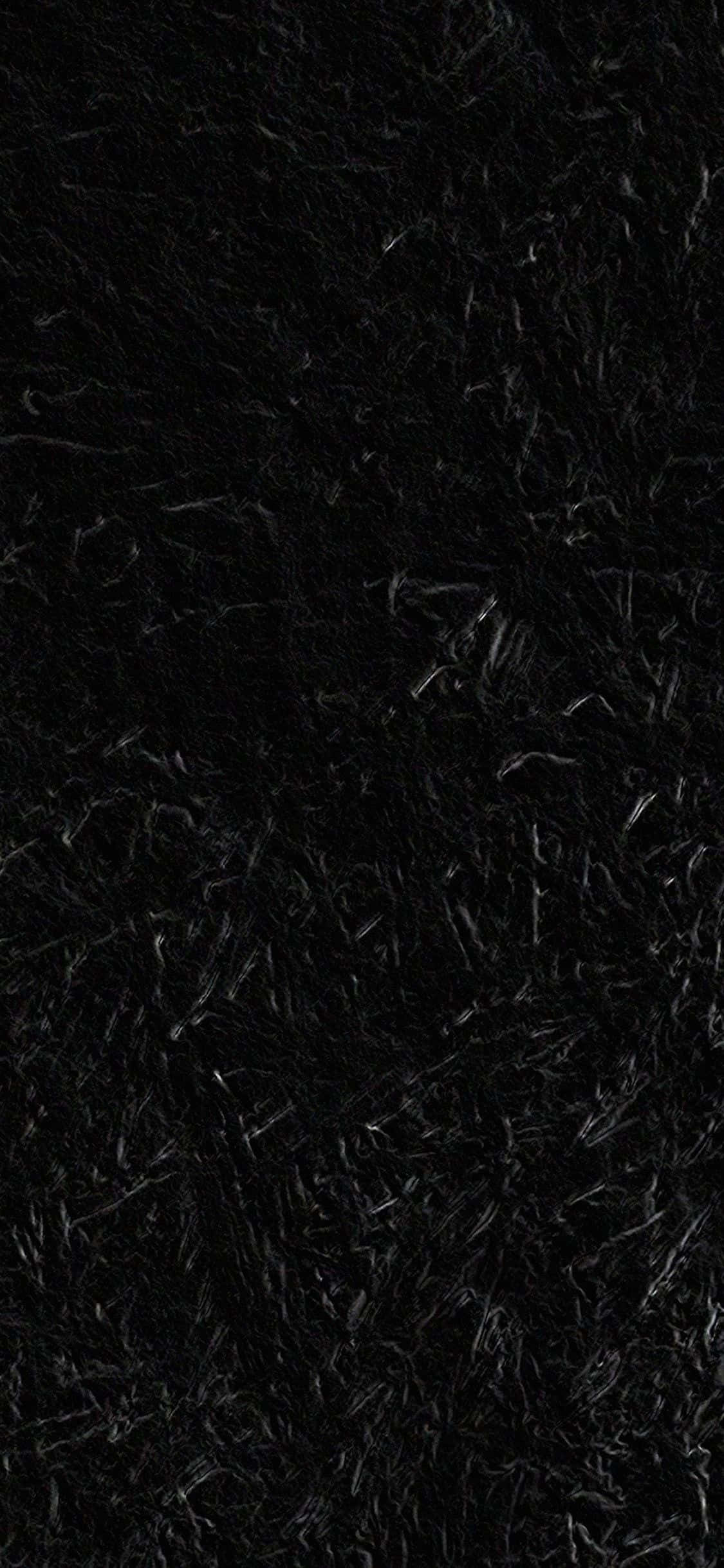 جريء وأنيق، هاتف آيفون الداكن الجديد كليًا خلفية
