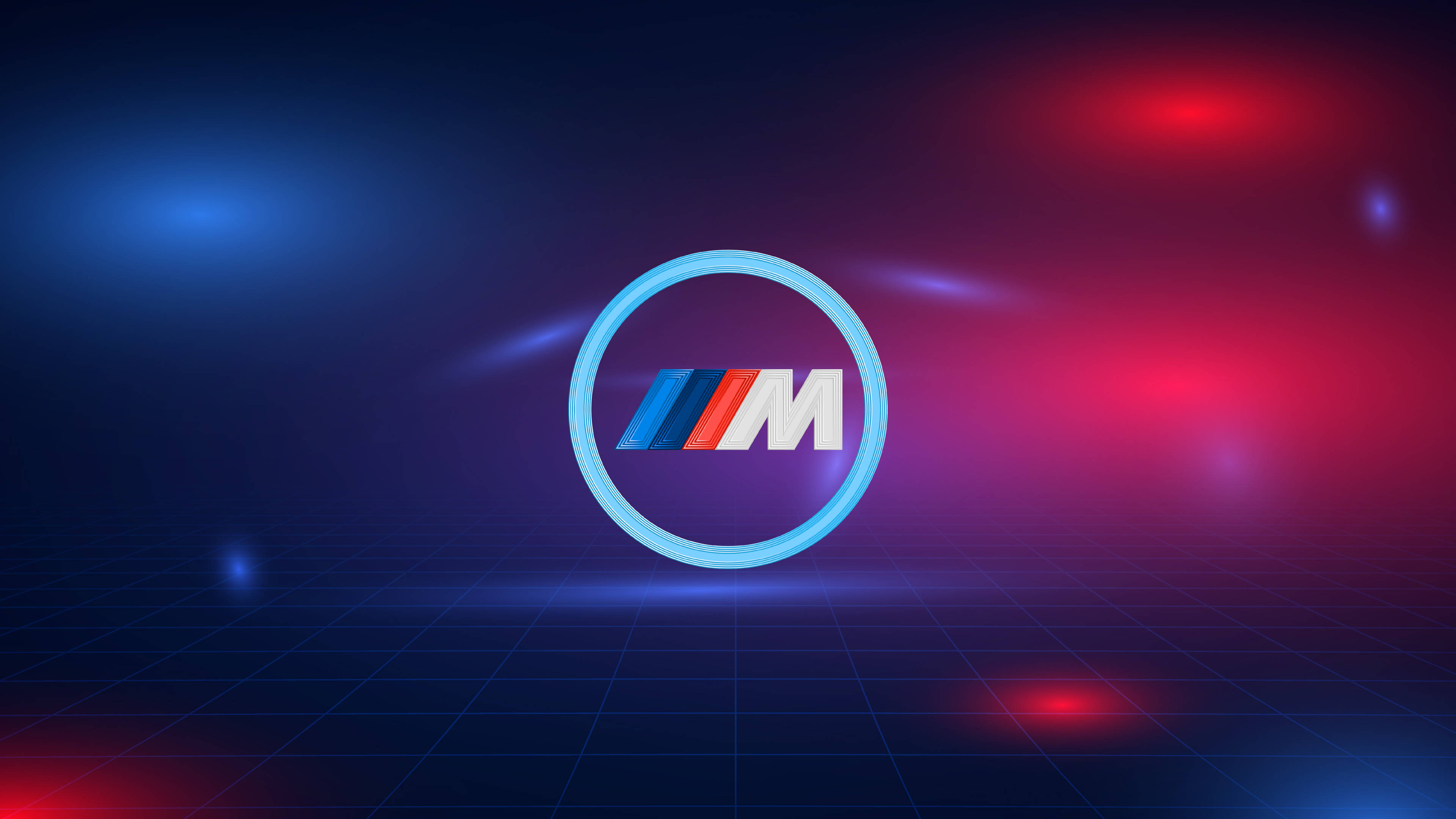 شعار BMW M باللونين الأزرق والأحمر مع إضاءة خلفية