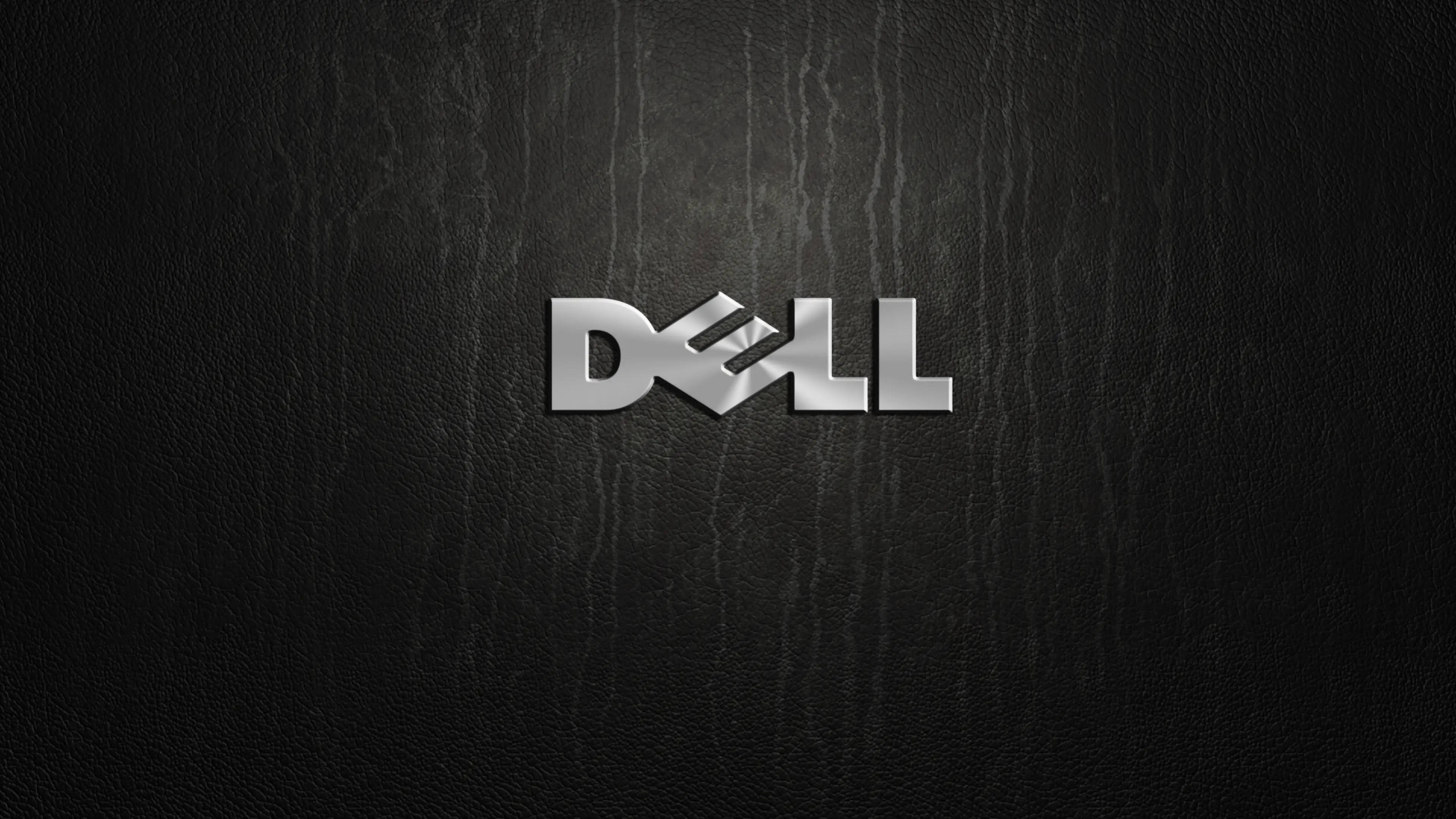 شعار Dell بدقة 4K على الخشب خلفية