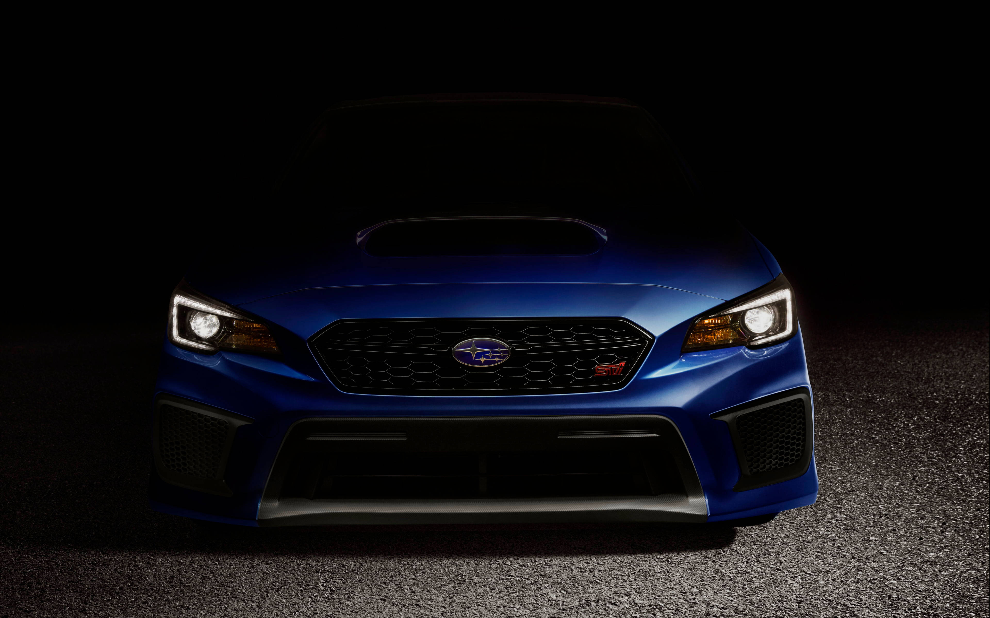 صورة مذهلة بدقة 4K لسيارة سوبارو WRX STI أثناء الحركة خلفية