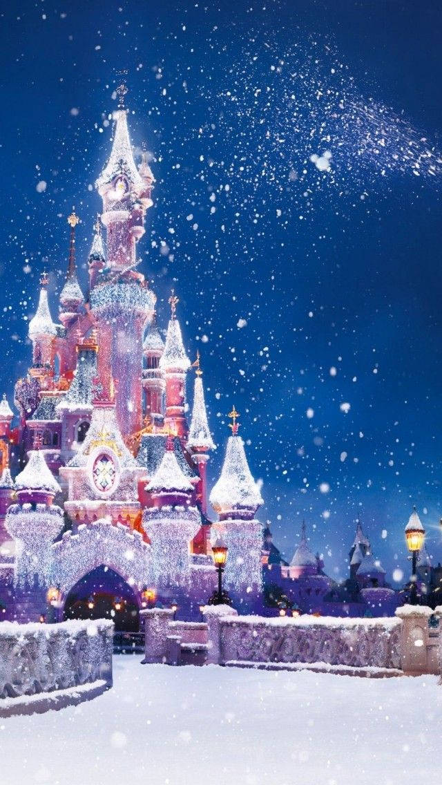 قلعة ديزني المثلجة في عيد الميلاد لأيفون خلفية