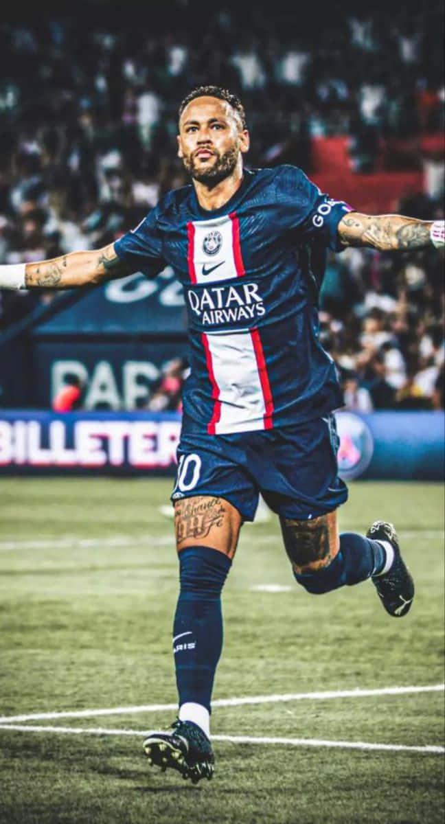 لاعب كرة قدم يركض في الملعب خلفية