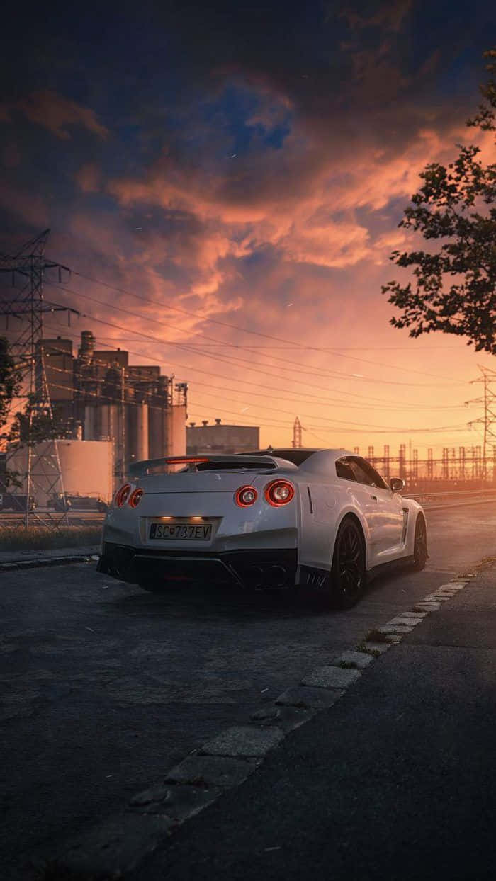 نيسان سكاي لاين خلفية آيفون مع غروب الشمس خلفية