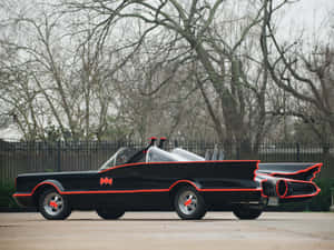 سيارة باتمان المقلدة باللونين الأحمر والأسود — باتمان خلفية